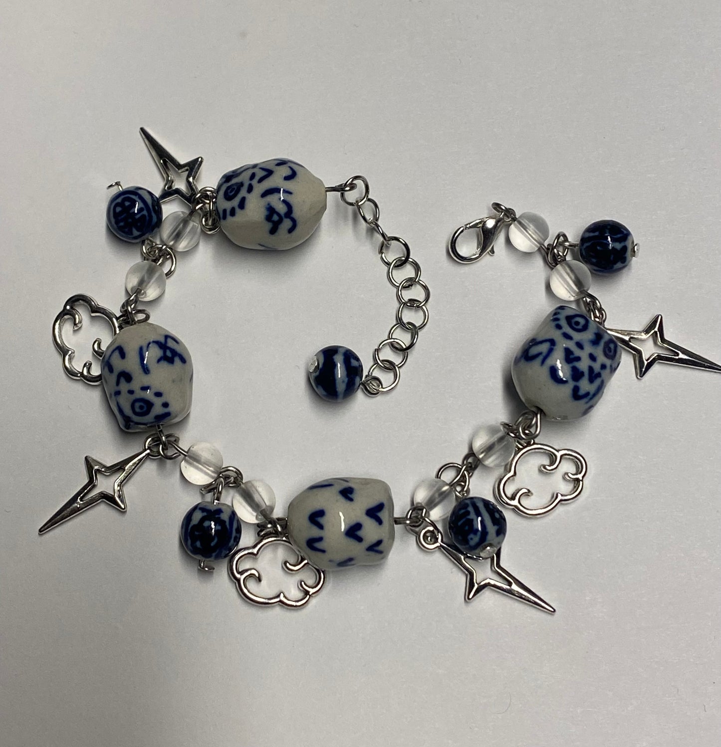 Owls in stars and clouds - bracelet